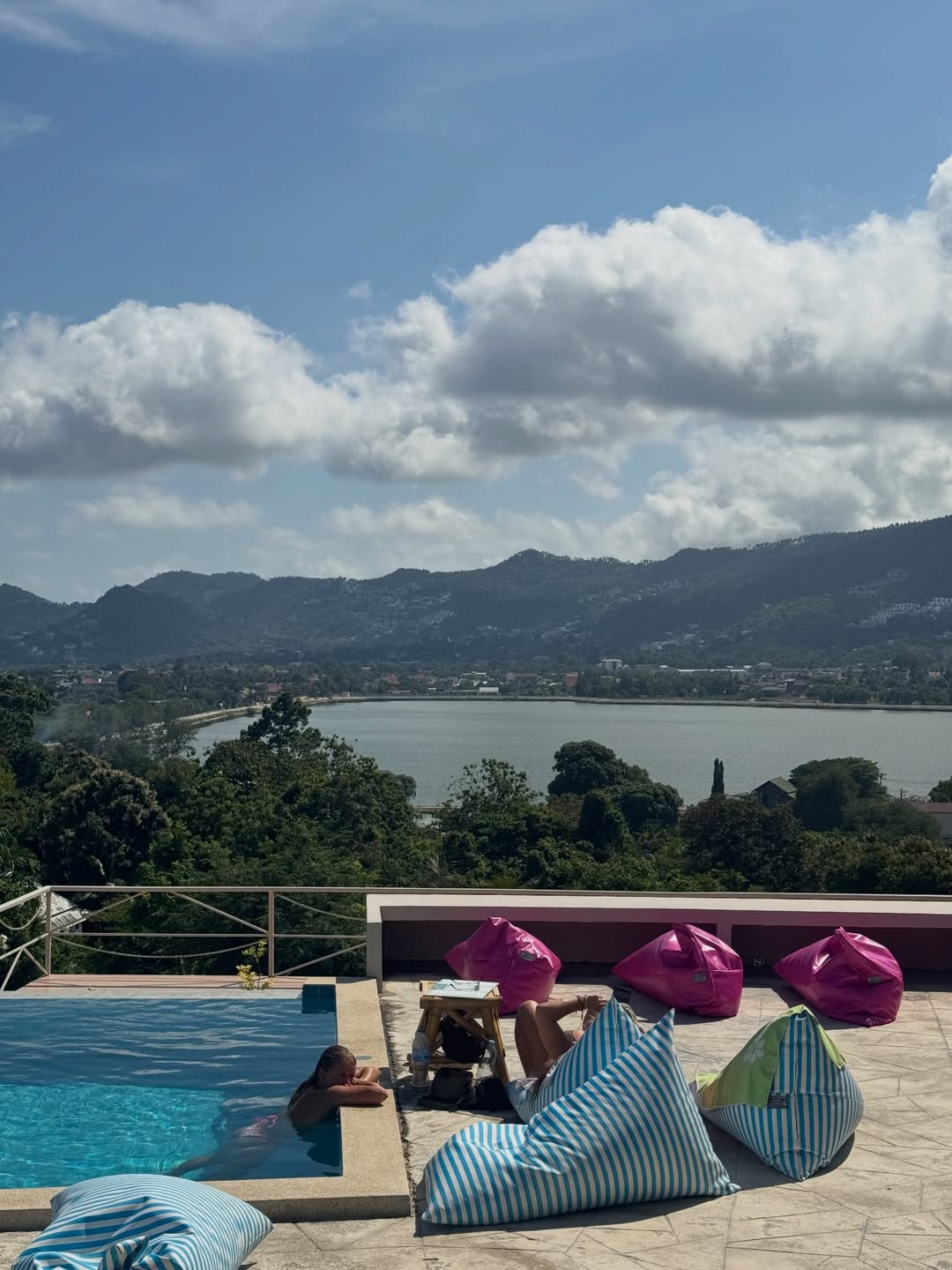 Infinity pool at Jump Shack with Chaweng Lake and the Koh Samui mountains behind